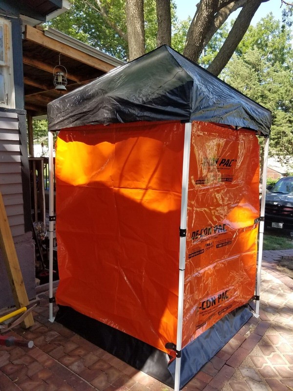 Portable shower Andax de con pac decontamination shower orange and black 